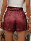 Women's Solid Color Belted Lace Hem Shorts