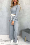 Women's casual tight T-shirt paired with contrasting wide-leg pants suit