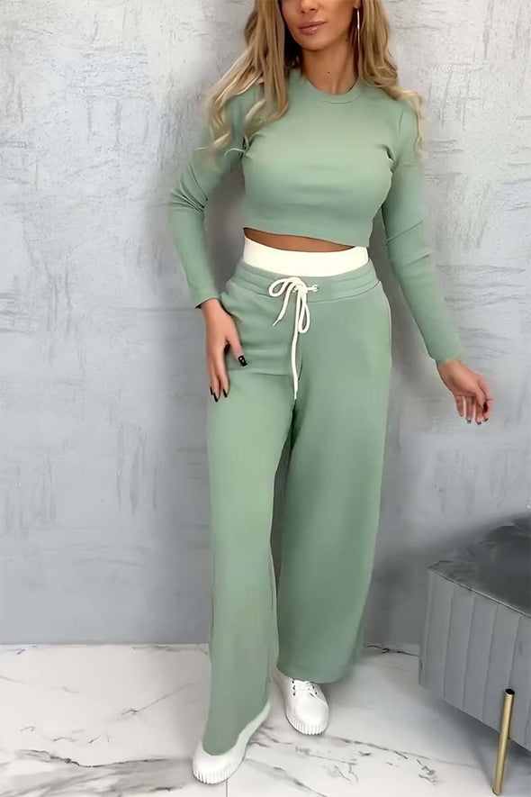 Women's casual tight T-shirt paired with contrasting wide-leg pants suit