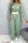 Women's casual tight T-shirt paired with contrasting wide-leg pants suit