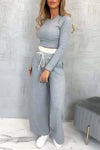 Women's casual tight T-shirt paired with contrasting wide-leg pants suit